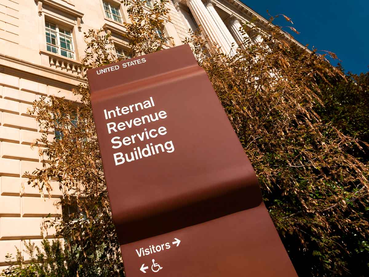 Internal Revenue Service Building sign outside headquarters, symbolizing agency warning on unreported CryptoPunks NFT taxes
