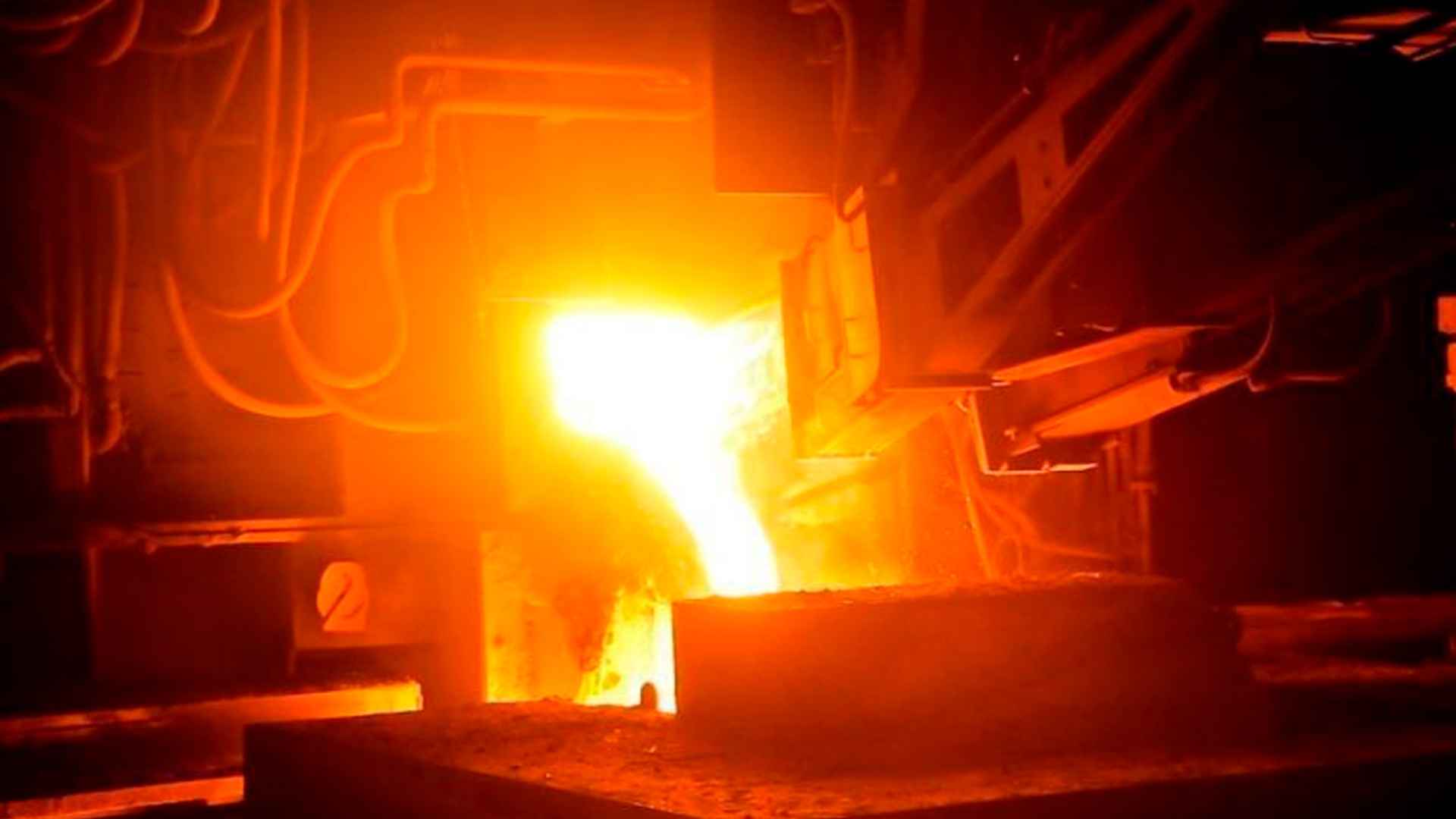 Molten gold pouring from furnace symbolizes ancient Egyptian smelting in newly discovered 3,000-year-old Sukari Mountains mine.