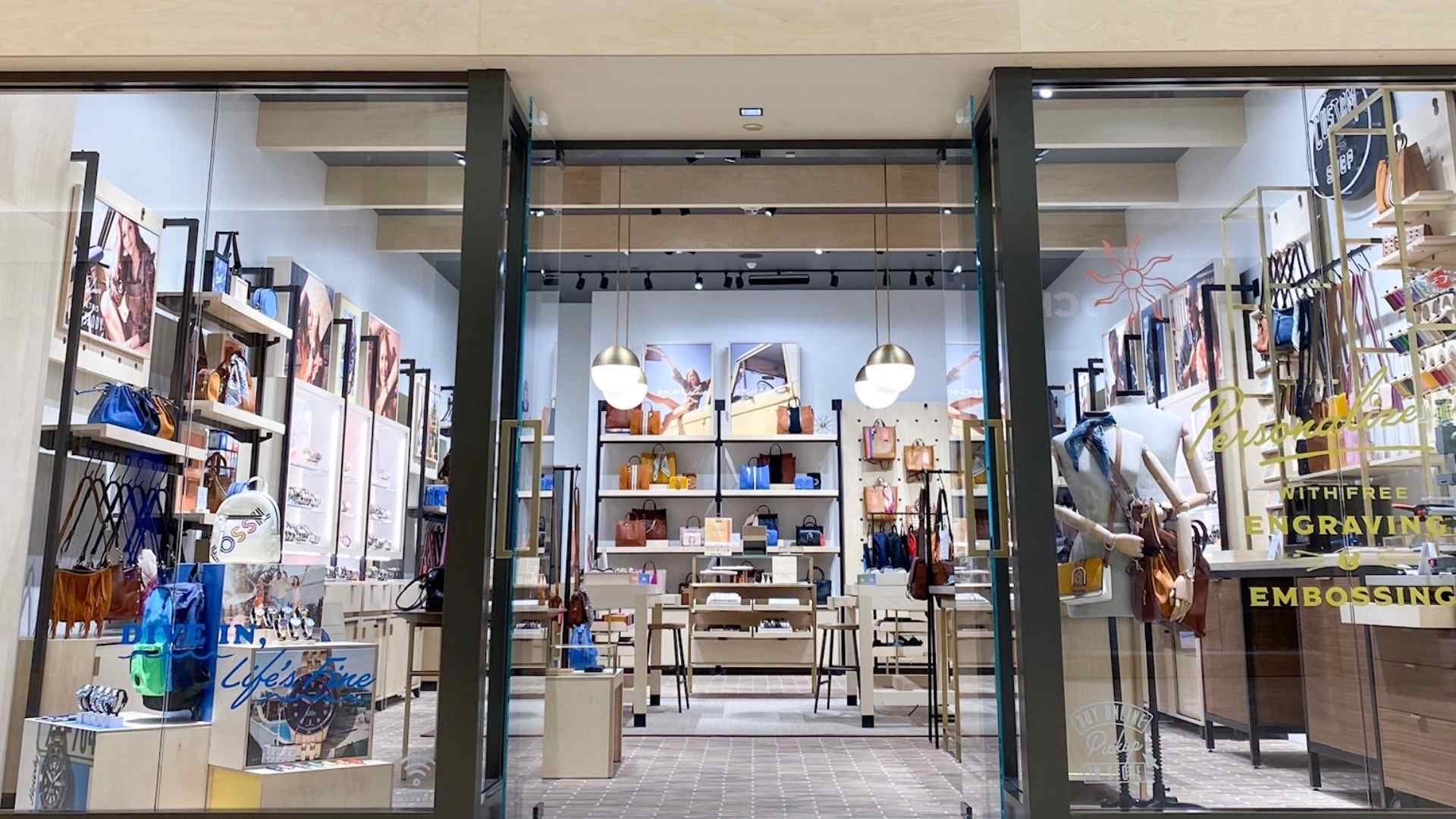 Interior of a Fossil retail store with handbags, backpacks and watch displays ahead of the brand’s 50 U.S. store closures
