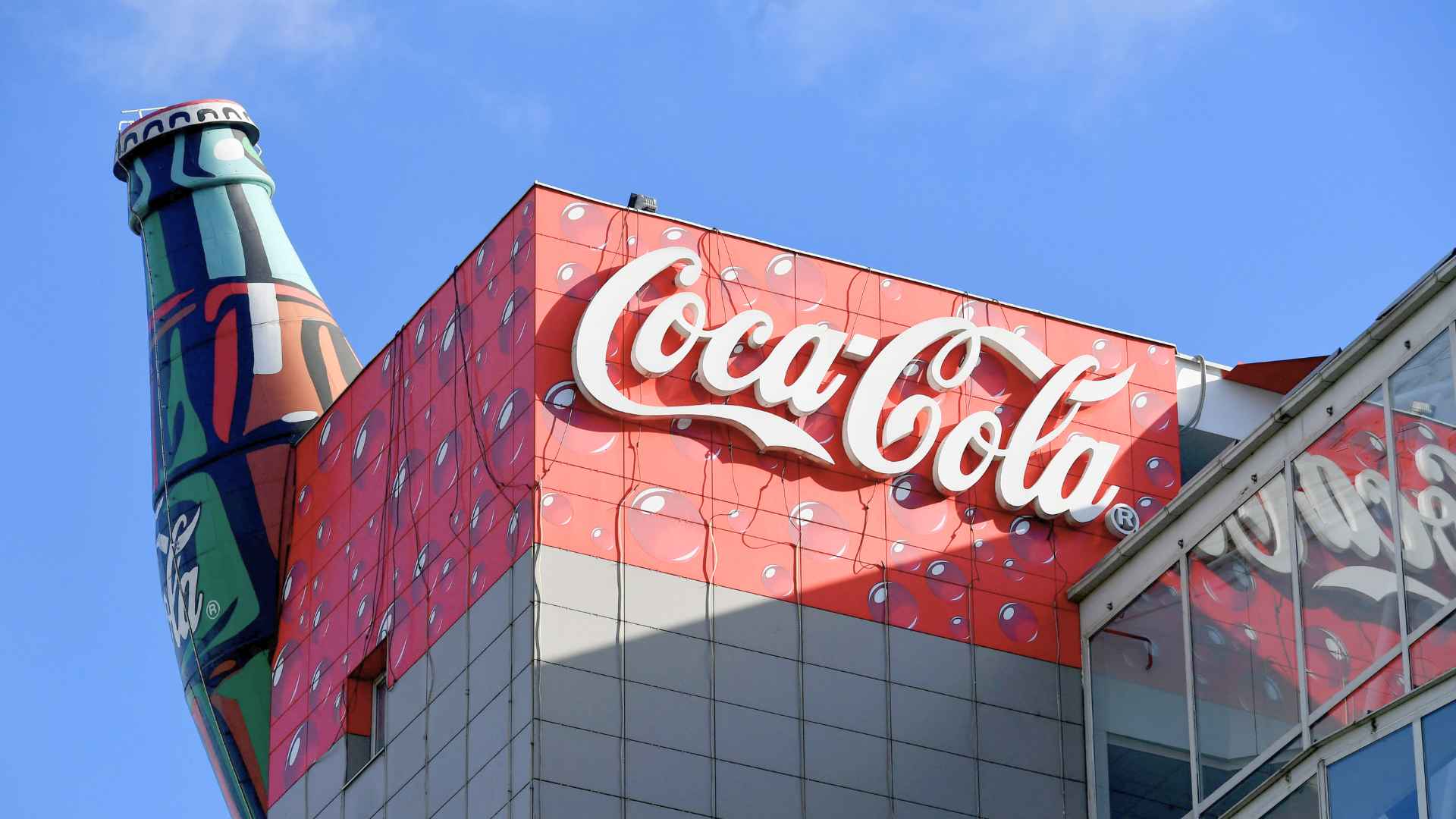 Coca-Cola logo signage on building facade ahead of new limited-edition drink launch
