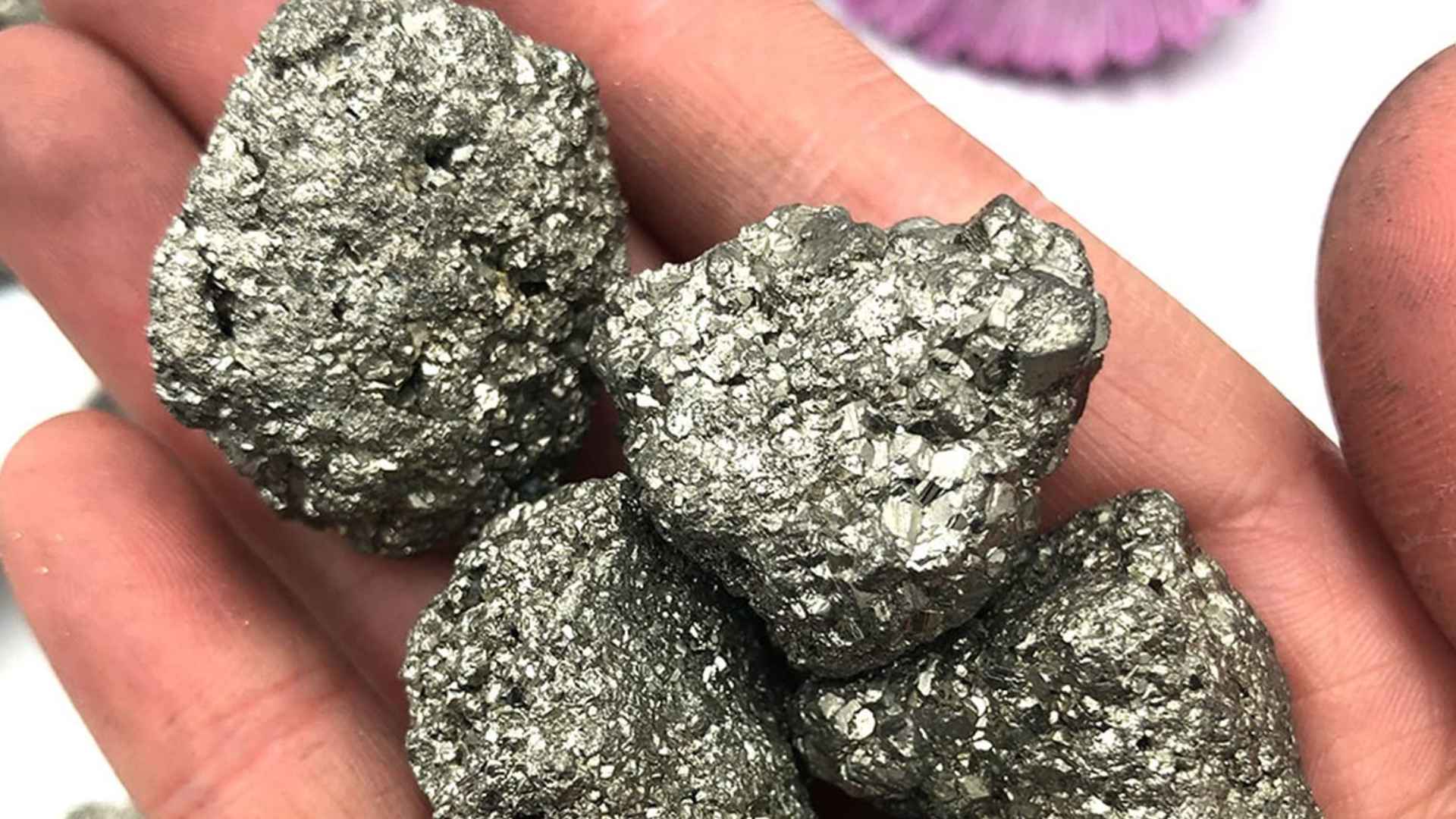 Close-up of raw iron ore nuggets from the record 55-billion-ton Hamersley deposit recently uncovered in Western Australia.