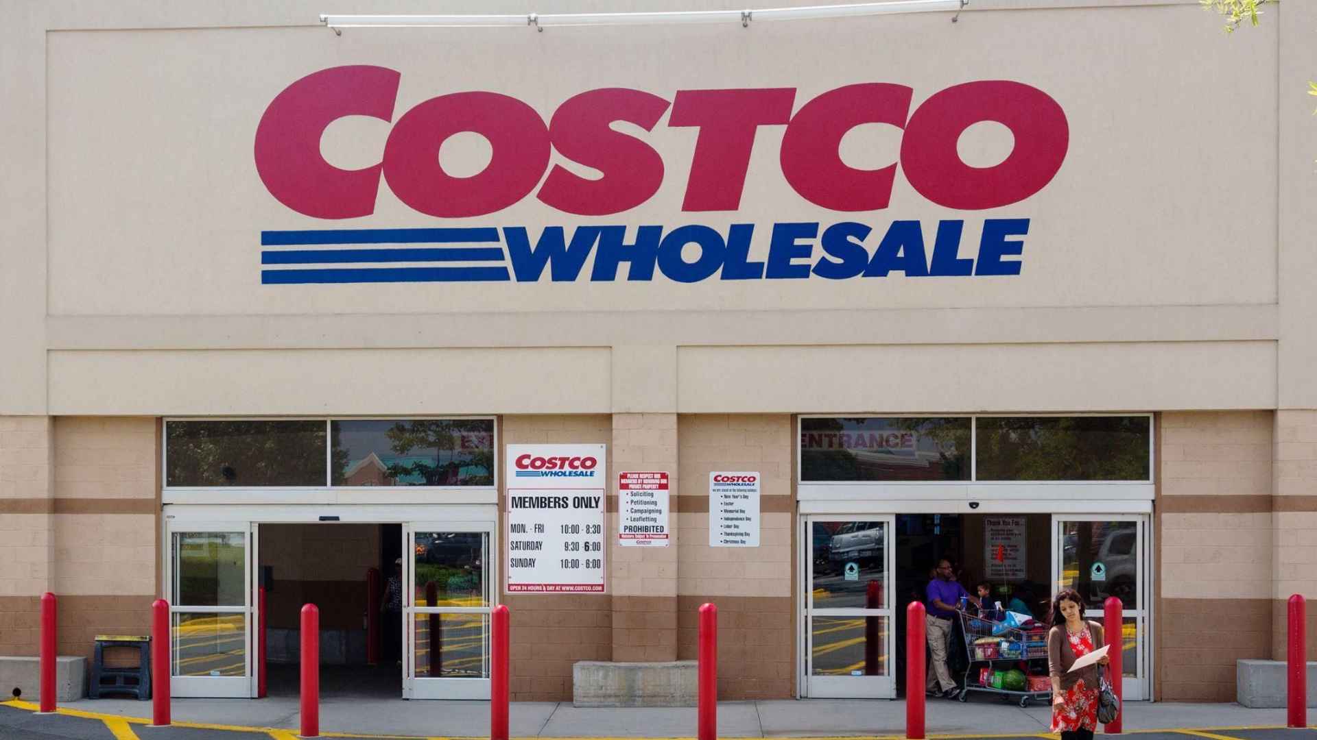 Costco Wholesale storefront with visible ‘Members Only’ sign at the entrance, illustrating the retailer’s tightened pay-to-enter membership policy