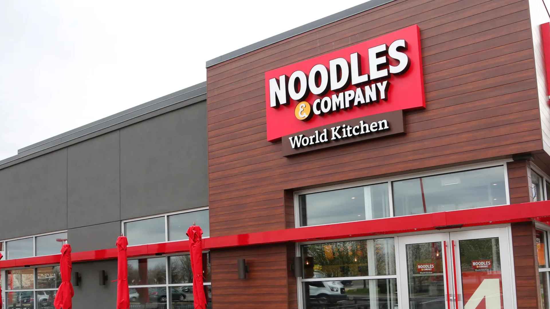Exterior of Noodles & Company fast-casual restaurant before the chain shutters up to 21 locations nationwide in 2025 realignment.