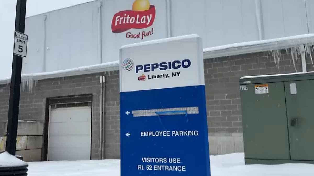 PepsiCo Liberty New York plant entrance sign with Frito-Lay logo on snowy day ahead of May 2024 closure