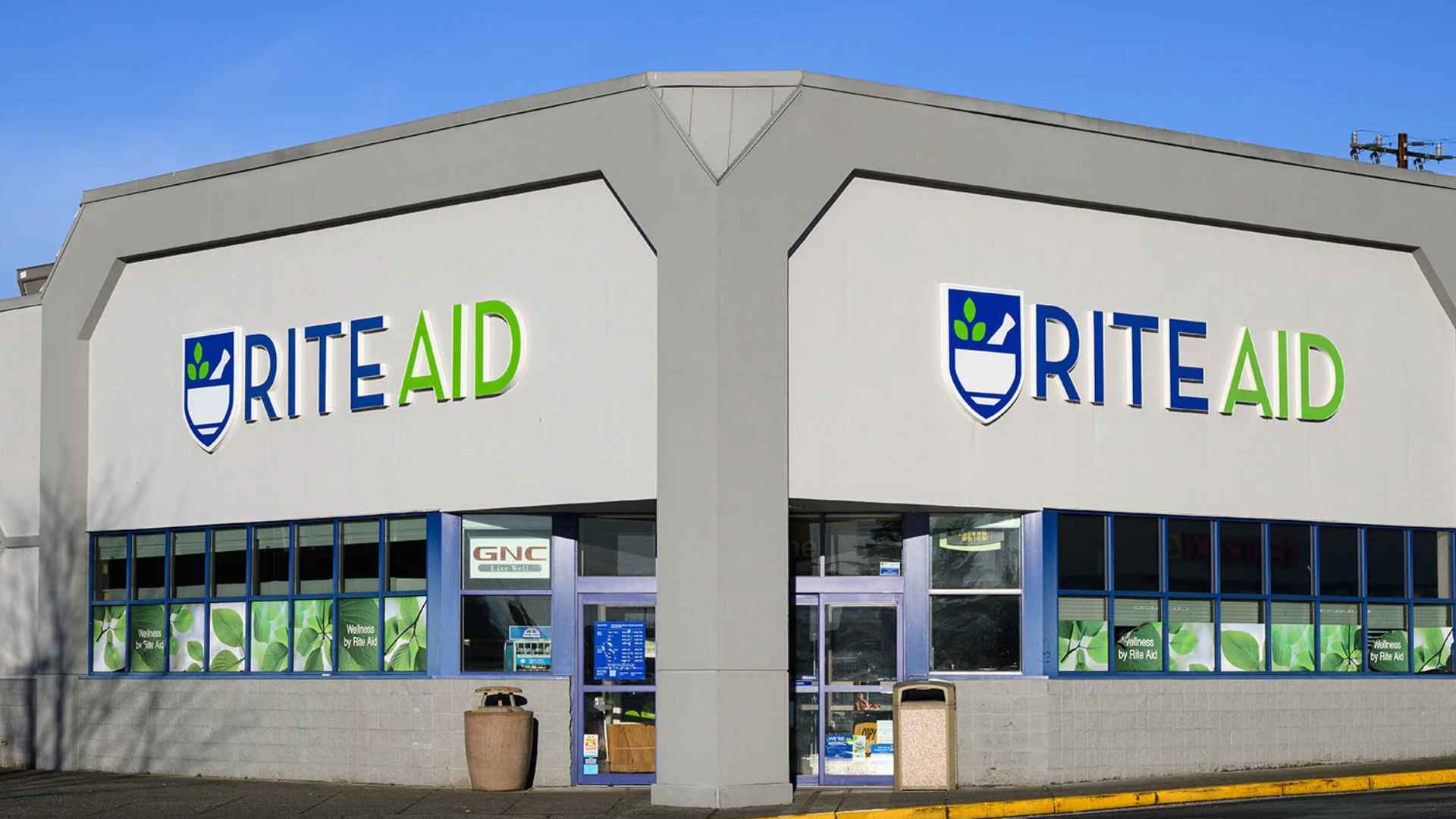 Rite Aid storefront exterior with prominent logo signage under clear sky ahead of nationwide pharmacy closures in 2025.