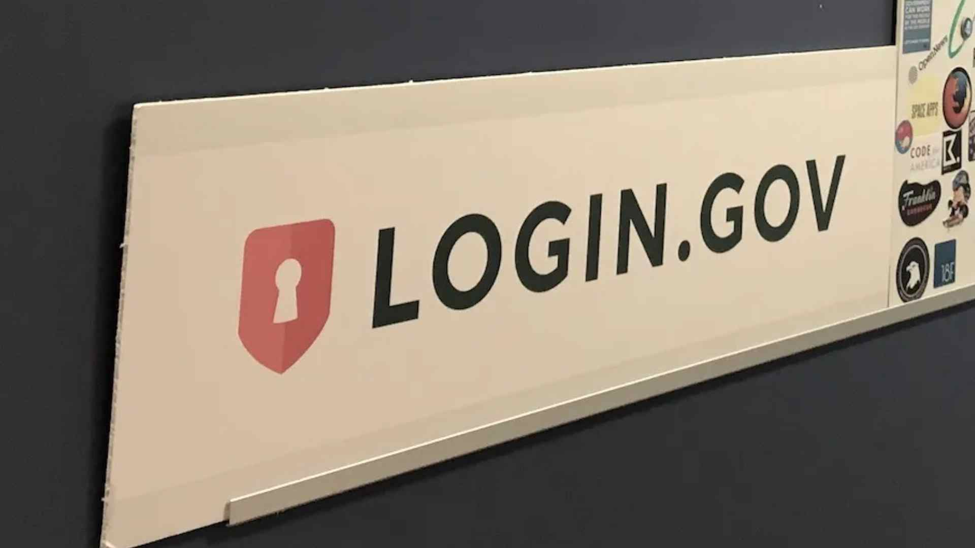 Login.gov sign featuring a red shield keyhole icon, illustrating the new secure login required by Social Security