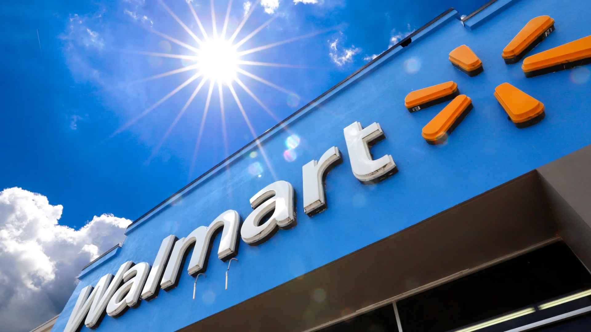 Walmart storefront under sunny sky showcasing retailer's envisioned future store concept for 2025