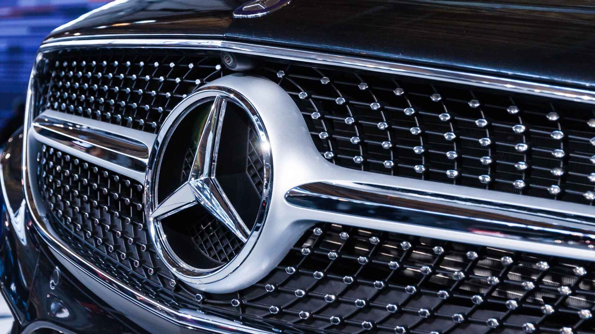 Close-up of the Mercedes-Benz front grille and emblem on a recalled GLC model from 2023 to 2025