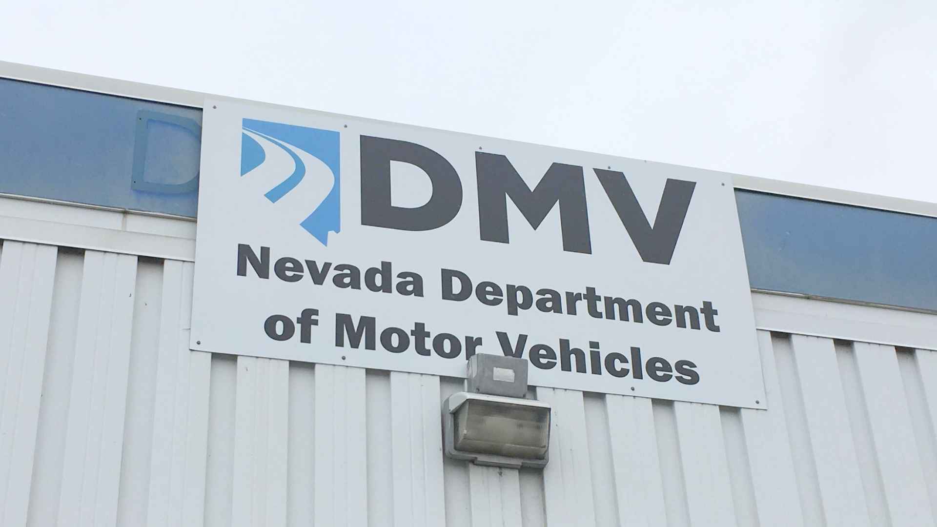 Sign of Nevada Department of Motor Vehicles (DMV) building with logo