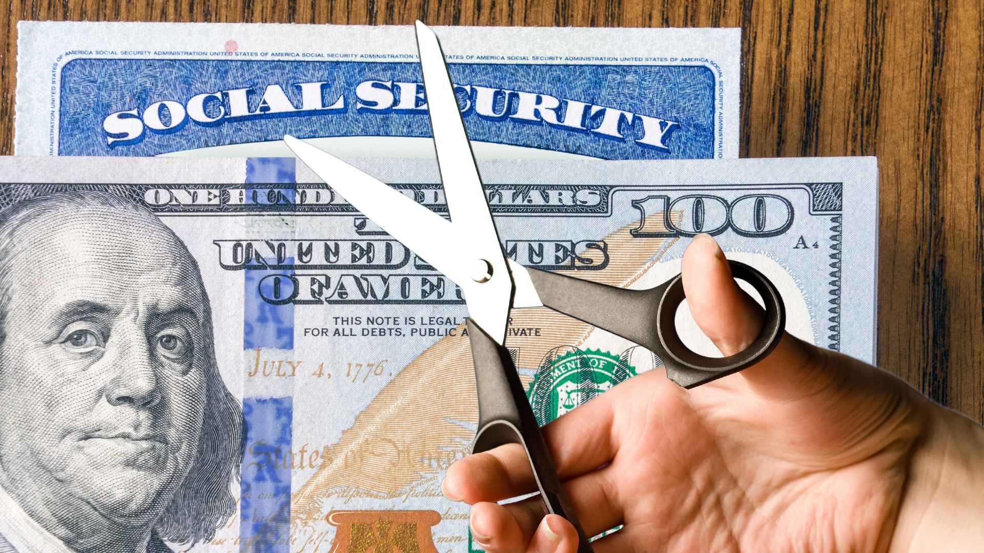 Scissors cutting a hundred-dollar bill over a Social Security card, symbolizing student loan garnishment of retirement benefits