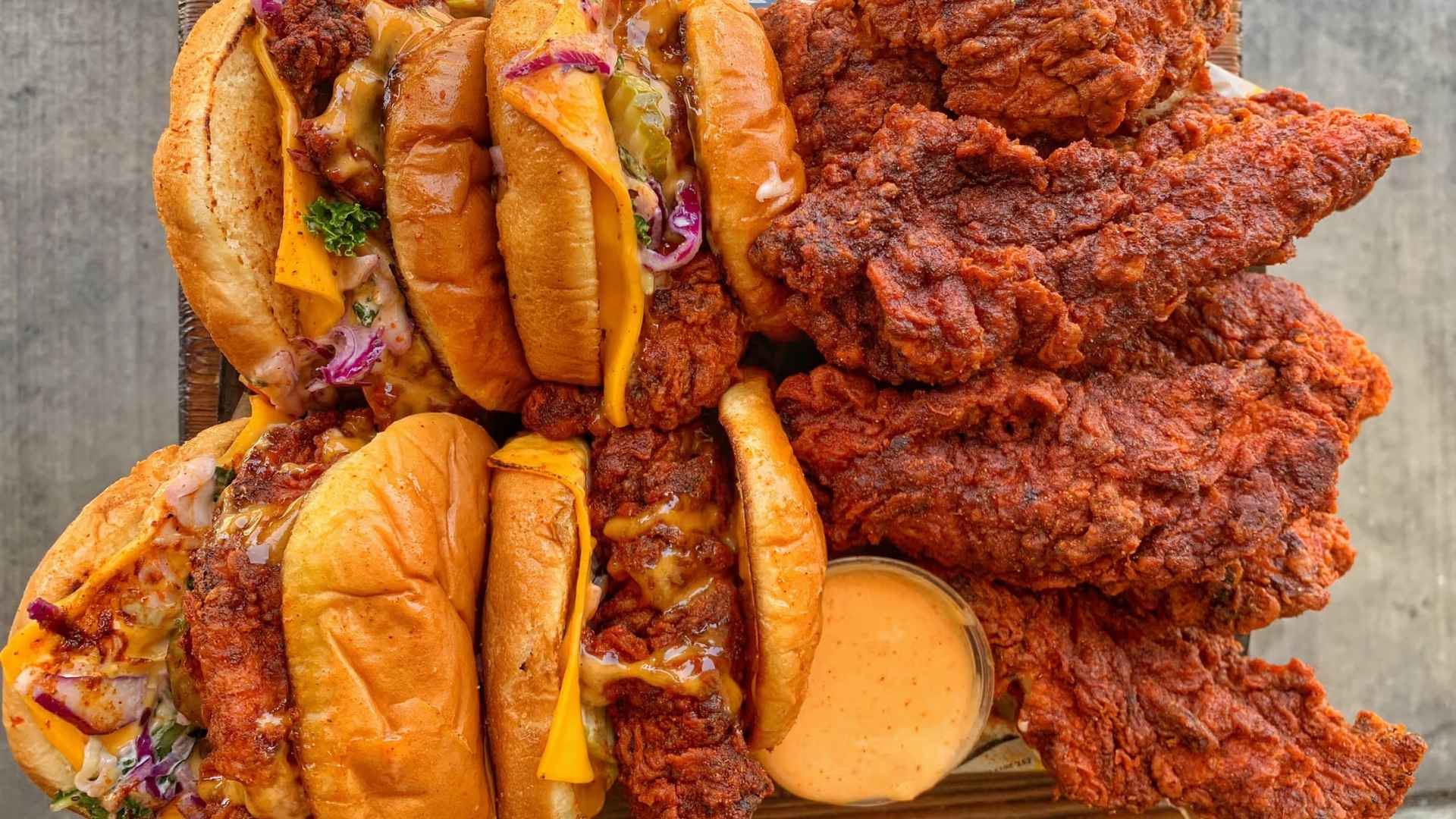 Nashville hot chicken sandwiches and crispy tenders platter from Dave’s Hot Chicken, the $900 LA start-up nearing a $1 billion sale.