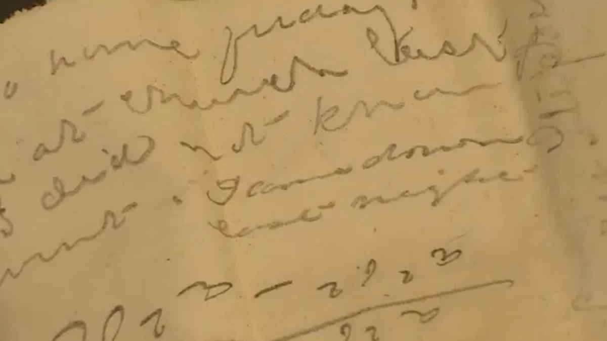 Close-up of a 19th-century handwritten student note found hidden in the walls of an 1806 Maine school during renovation.