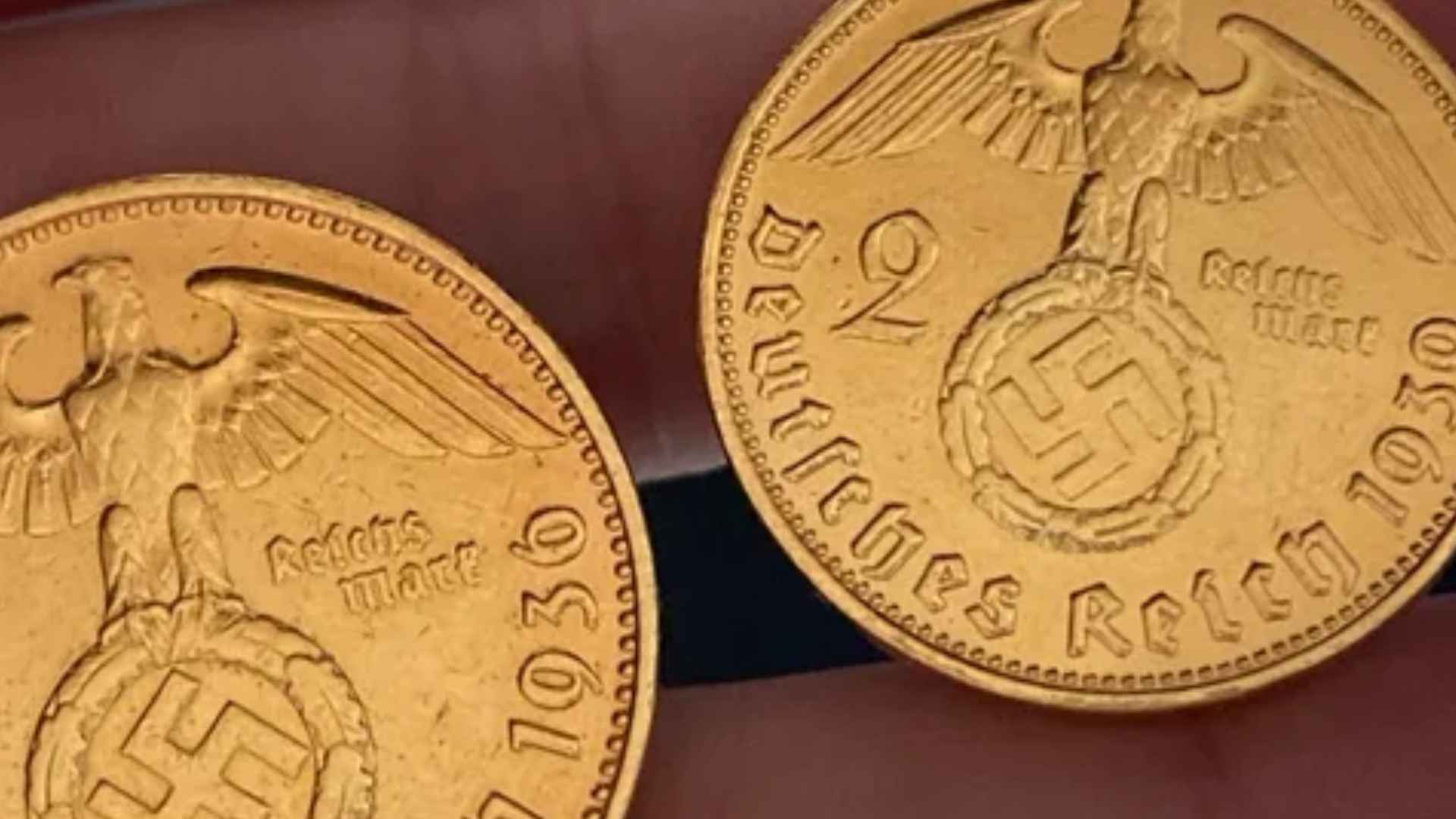 Close-up of Nazi-era 2 Reichsmark gold coins from the Traveller Collection, a $160 million treasure buried for 50 years and now resurfacing for auction