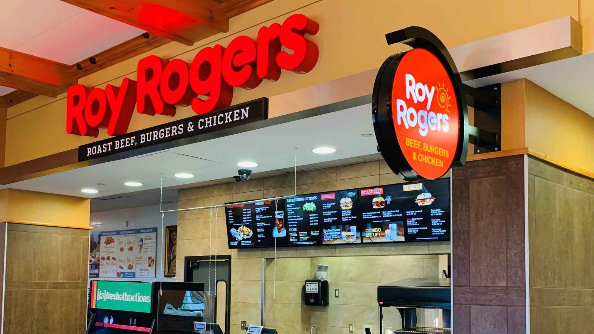 Roy Rogers fast food restaurant interior counter showing roast beef, burgers, and chicken menu items