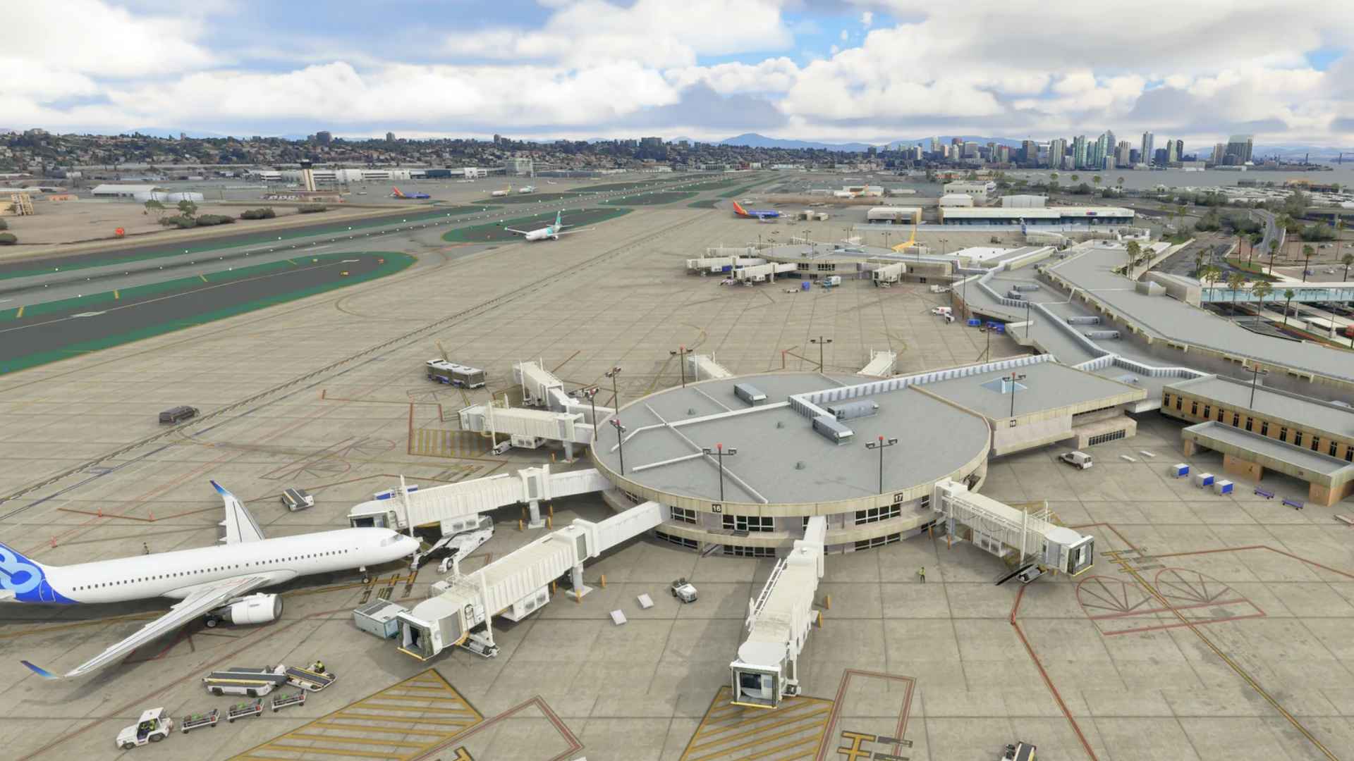 Aerial view of airplanes parked at gates in major US airport affected by flight cancellations