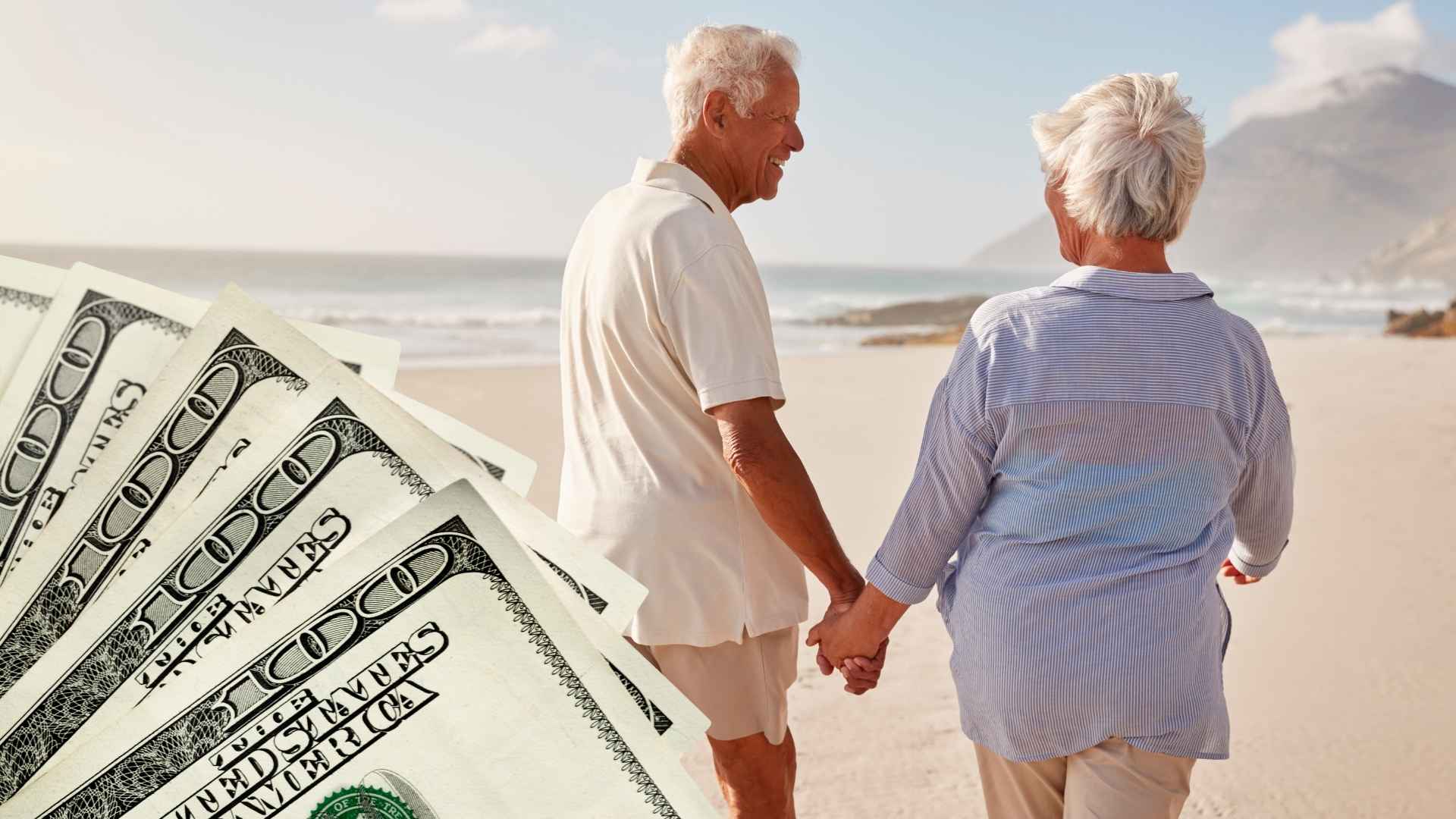 Older couple walking on the beach holding hands with hundred-dollar bills in the foreground, symbolizing retirement planning.