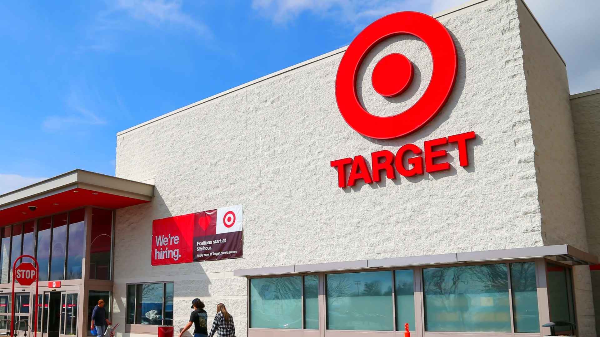 Exterior view of a Target store displaying a "We're hiring" sign, indicating job opportunities at new locations.