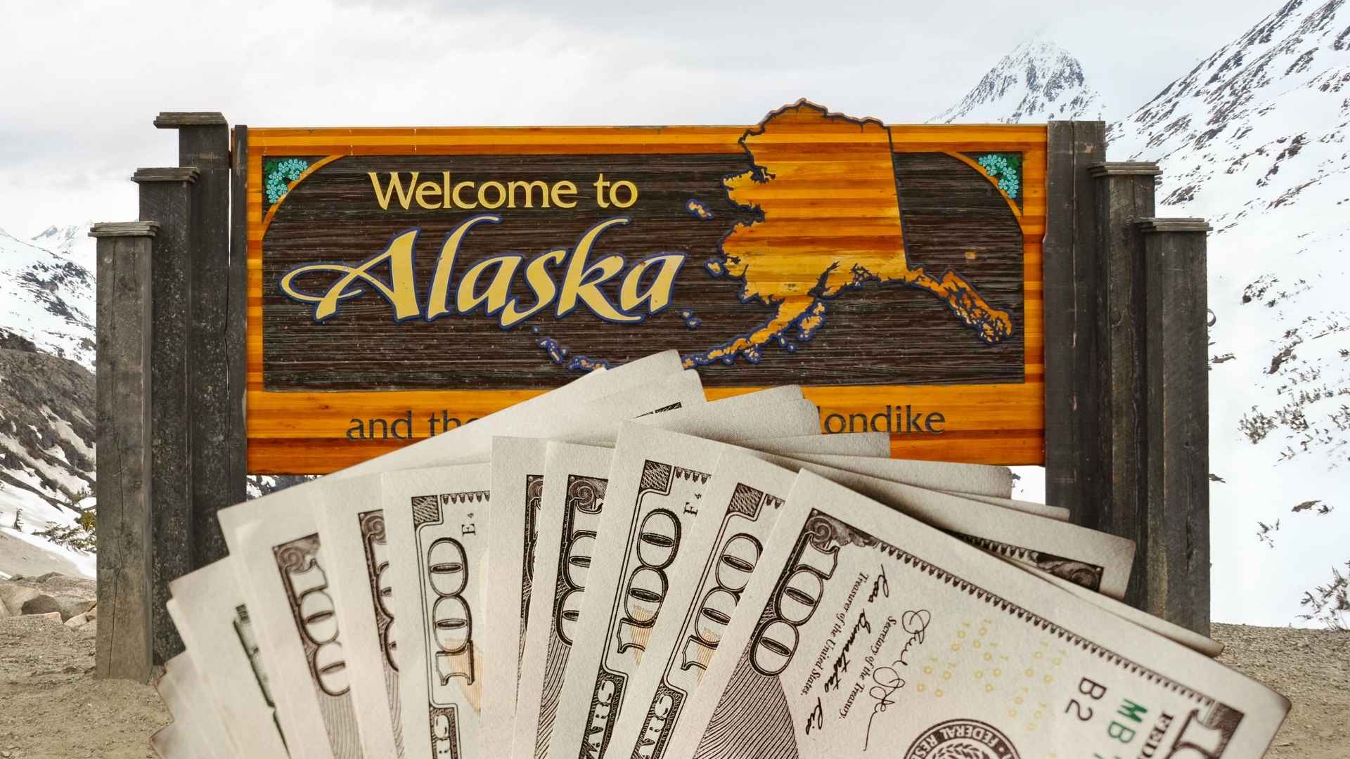 Alaska welcome sign with cash representing the $1,702 August 2025 stimulus checks