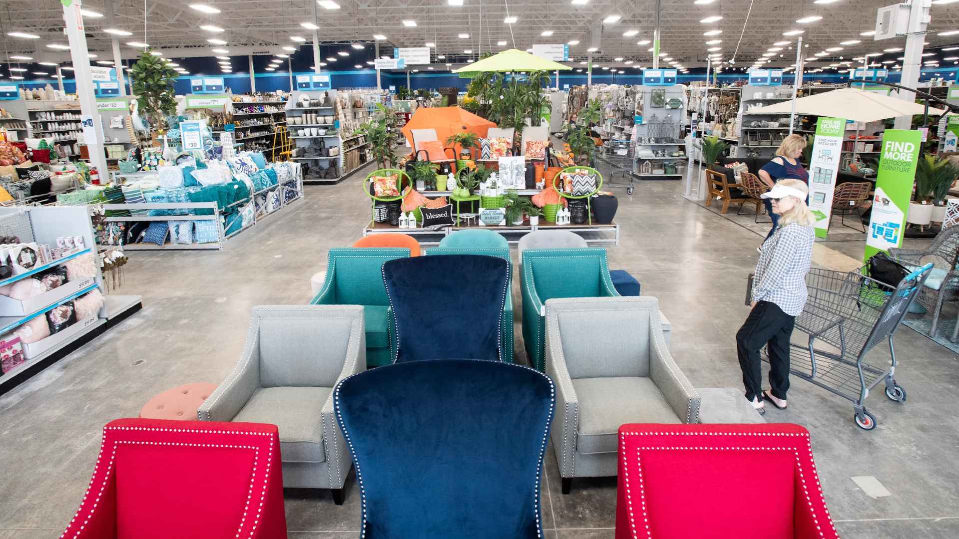 Interior of a home decor store displaying furniture and home accessories, highlighting store closures across the U.S.