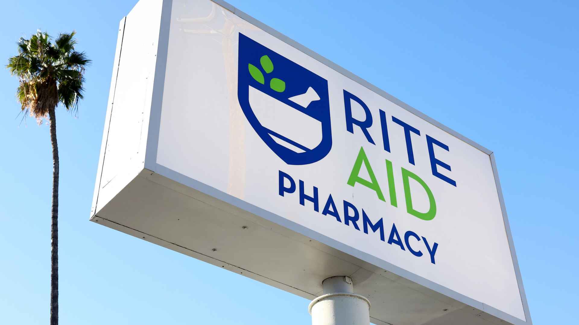 Rite Aid pharmacy sign as chain announces total liquidation and nationwide store closures
