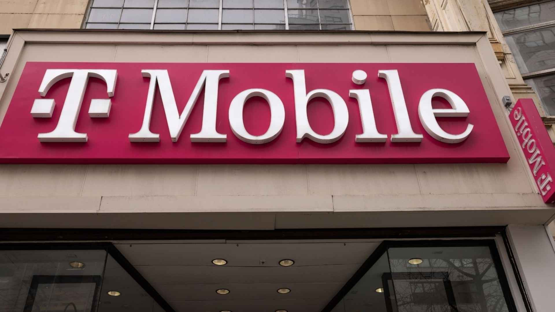 Exterior of a T-Mobile store sign after completion of UScellular acquisition boosting rural connectivity.