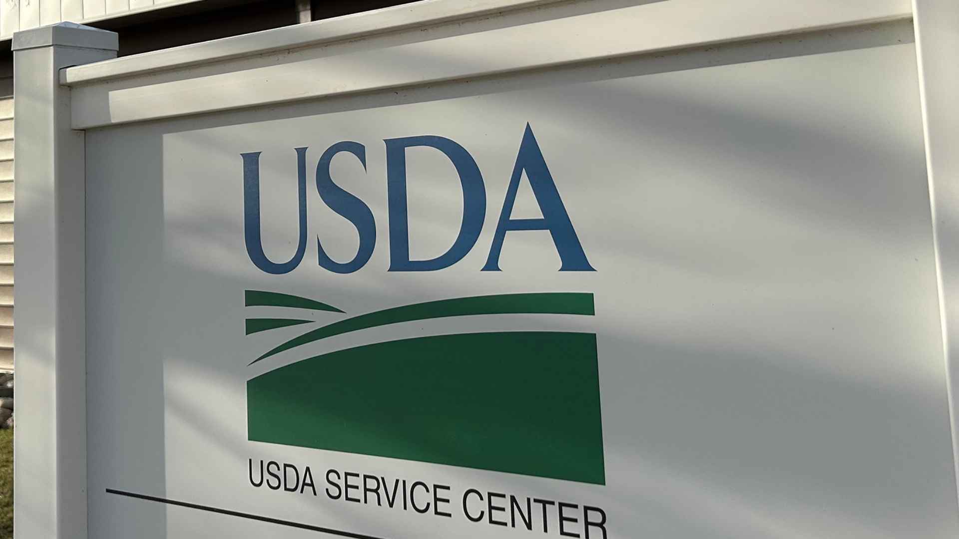 Sign for USDA Service Center outside federal building during regional office closures