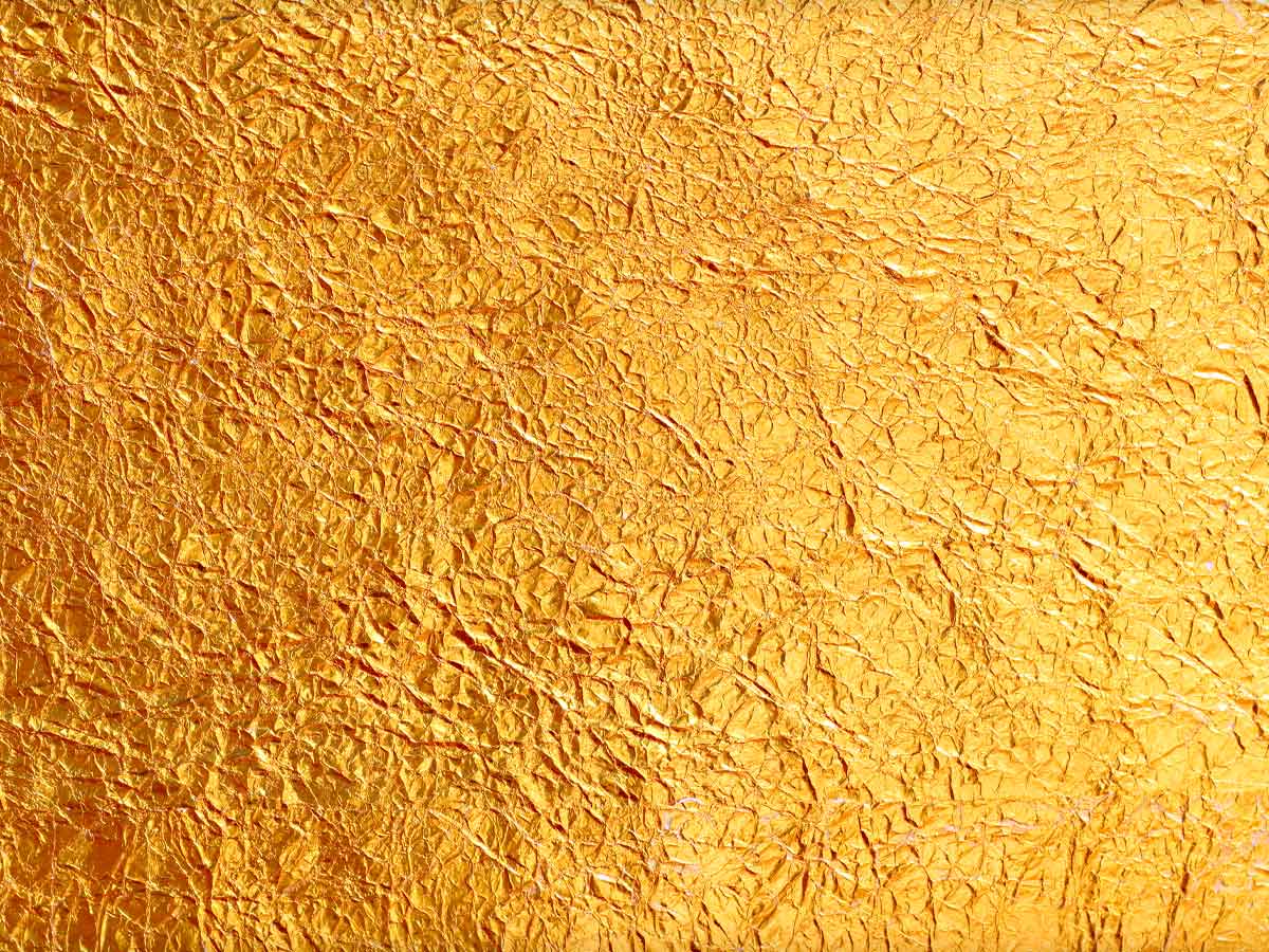 Textura dorada que representa el hallazgo de un yacimiento de oro bajo un jardín en Francia