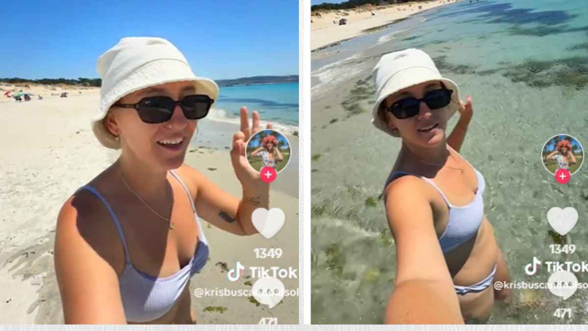 Turista mostrando decepción por la fría temperatura del agua en una playa del Caribe gallego, Galicia.
