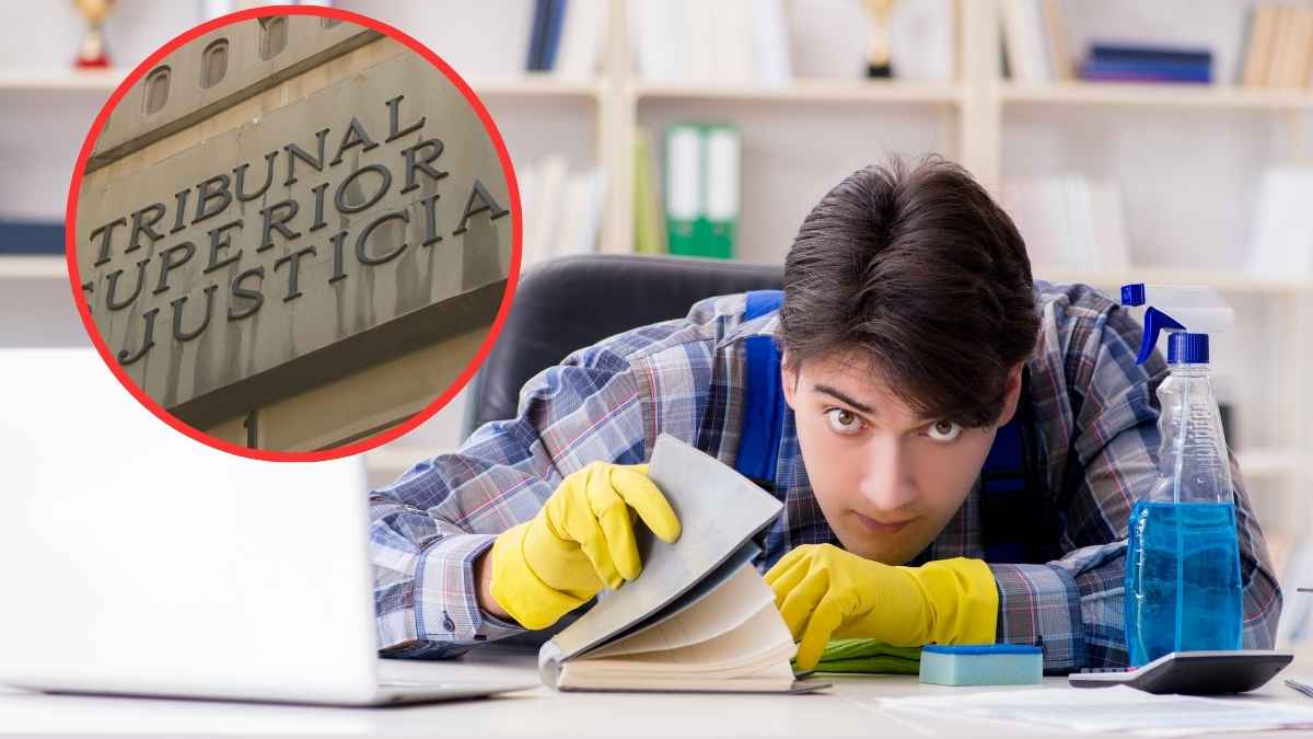 Trabajador en su puesto de limpieza tras ser despedido injustamente y compensado por la justicia laboral.