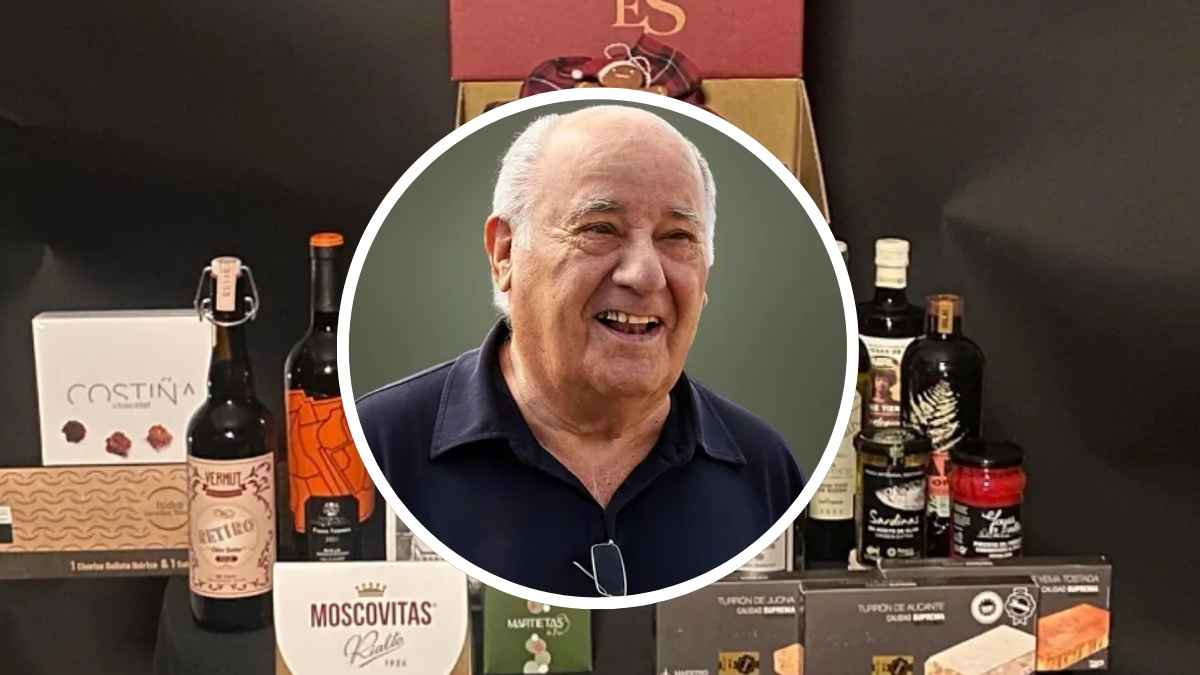 Cesta de Navidad de Inditex con productos gourmet junto a imagen del fundador de la compañía