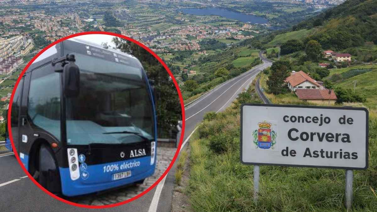 ALSA autobús eléctrico circulando por la carretera en Corvera de Asturias, con el cartel que señala el municipio, paisajes naturales y viviendas a lo lejos.