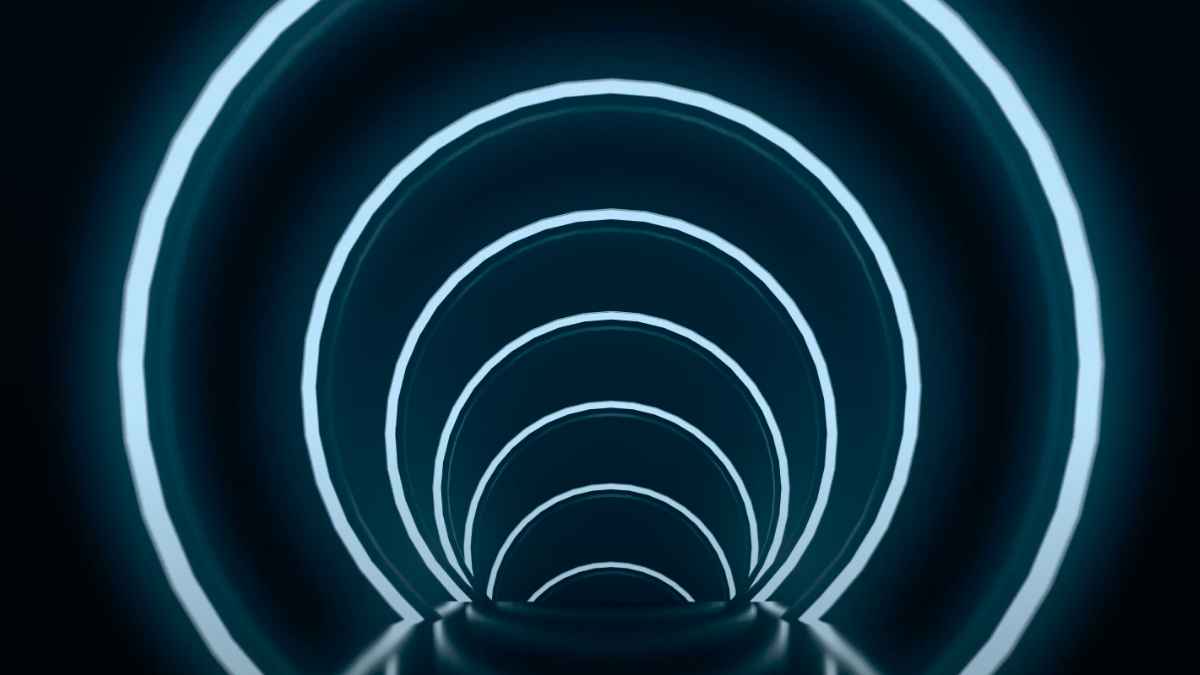 Interior de un túnel con iluminación circular, imagen ilustrativa del nuevo túnel bajo los Alpes que reduce el viaje a 41 minutos