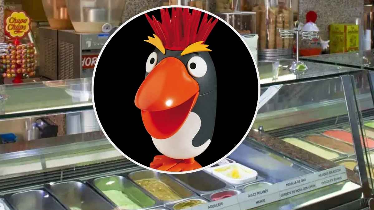 Helado Punky con forma de pingüino y cresta roja de La Menorquina sobre fondo negro
