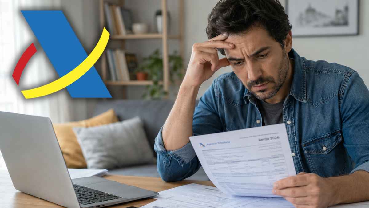 Contribuyente revisa documentos de la Renta 2026 con preocupación por no poder pagar a Hacienda